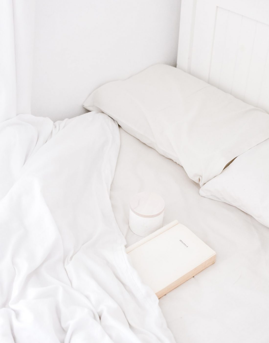 white-bed-book